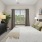 a bedroom with a large bed