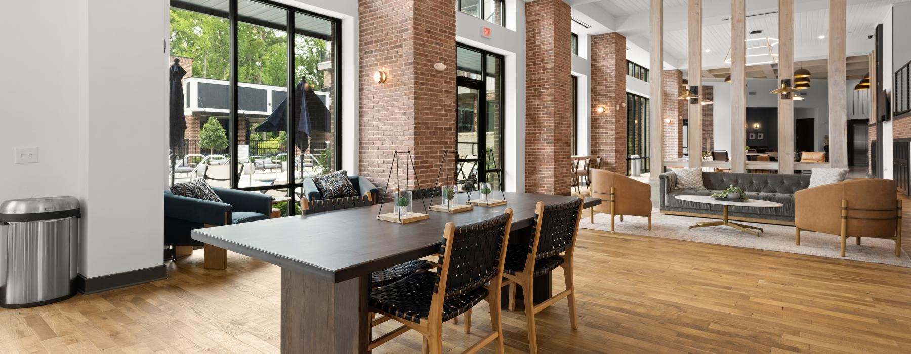 a large room with a table and chairs