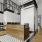a room with a desk and a rug