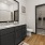 a bathroom with a black countertop