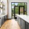 a kitchen with a large window