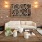 a living room with a brick wall