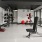 Large room with exercise equipment at The Grace at Tryon Charlotte apartments with a gym.