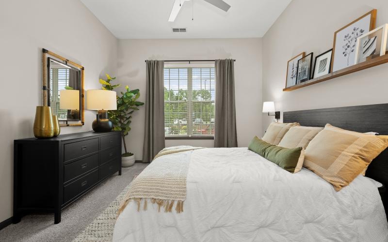 Comfortable bedroom in an upscale Charlotte apartment at The Grace at Tryon